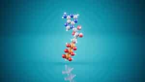 3D molecular model of atp on a blue background.